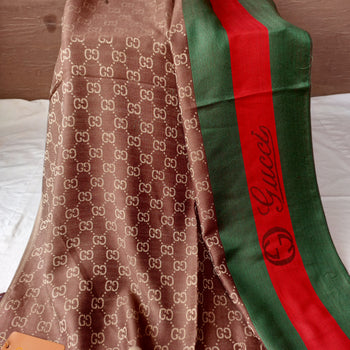 Gucci – Brown